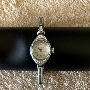 Women’s small “petite” watch.